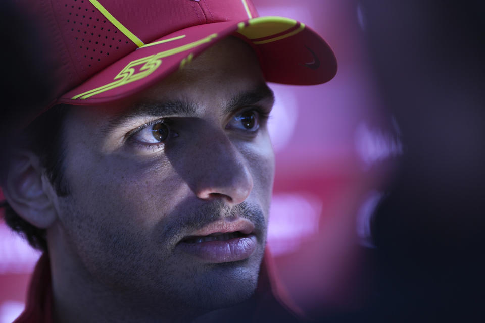 Ferrari driver Carlos Sainz of Spain reacts as he is interviewed ahead of the Australian Formula One Grand Prix at Albert Park, Melbourne, Australia, Thursday, March 21, 2024. (AP Photo/Asanka Brendon Ratnayake)