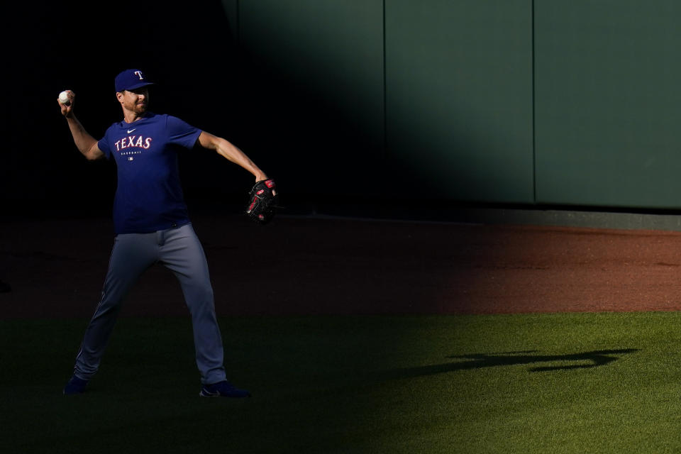 Texas Rangers pitcher Jacob deGrom works out prior to a baseball game against the Baltimore Orioles, Friday, May 26, 2023, in Baltimore. (AP Photo/Julio Cortez)