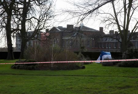 A police forensic tent stands erected in an area near the grounds of Kensington Palace in London, Britain February 9 2016. REUTERS/Neil Hall