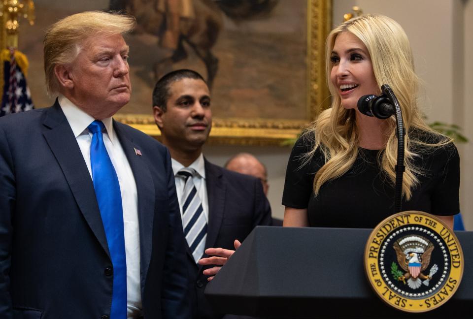 US President Donald Trump listens to his daughter Ivanka Trum speak during an announcement about 5G network deployment in the Roosevelt Room at the White House in Washington, DC, on April 12, 2019. (Photo by NICHOLAS KAMM / AFP)        (Photo credit should read NICHOLAS KAMM/AFP/Getty Images)