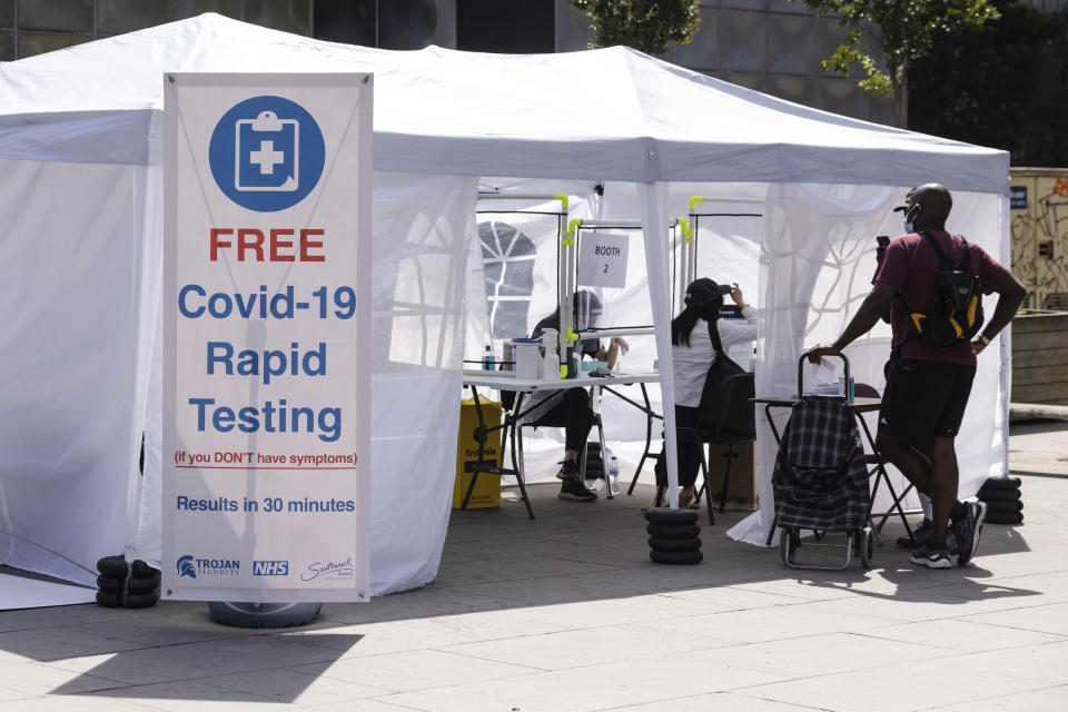 LONDON, ENGLAND - JUNE 15: A Covid-19 rapid testing facility is set up in Elephant and Castle on June 15, 2021 in London, England. Around 30 million people, or 45 percent, in the UK are fully vaccinated against Covid-19, but the government has postponed the full easing of social restrictions for another month, to allow time to expand its vaccination programme even further. (Photo by Dan Kitwood/Getty Images)