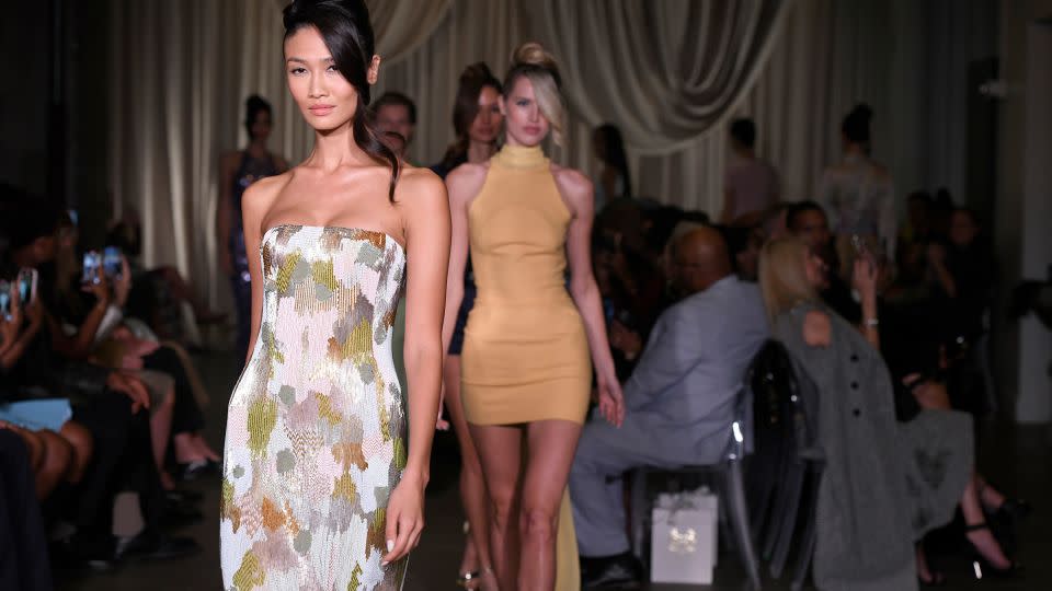 A multi-colored sequinned gown in Sergio Hudson’s 1960s-influenced collection. - Fernanda Calfat/Getty Images