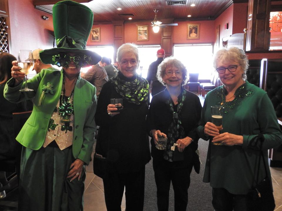 Laura Kenney, Carole Cornell, Louise Brown and Jewell Terry enjoyed drinks during a St. Patrick's Day Pub Crawl at Thompson Ninety-Nine. It was the first use of a new Designated Outdoor Refreshment Area that features most of Downtown Coshocton, Roscoe Village and Clary Gardens.