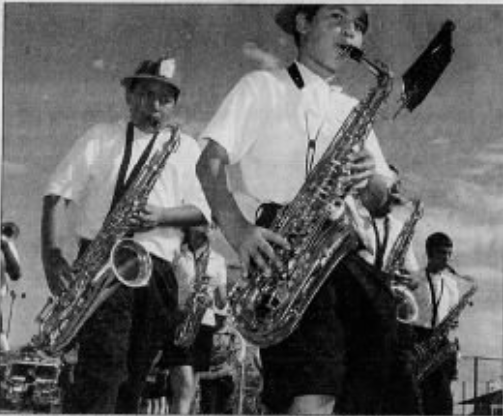 Ray Ramirez plays the saxophone in the Marc T. Atkinson Middle School Band in September 2005.