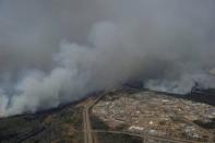 A Canadian Joint Operations Command aerial photo shows wildfires near neighborhoods in Fort McMurray, Alberta, Canada in this image posted on twitter May 5, 2016. Courtesy CF Operations/Handout via REUTERS ATTENTION EDITORS - THIS IMAGE WAS PROVIDED BY A THIRD PARTY. EDITORIAL USE ONLY. NO RESALES. NO ARCHIVE