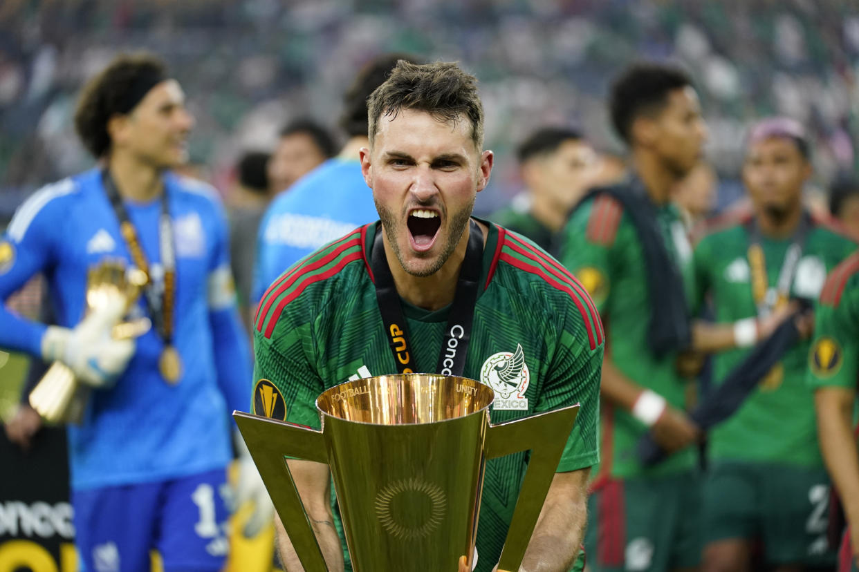 Mexico's Santiago Gimenez lift the winner's trophy after beating Panama 1-0 in the CONCACAF Gold Cup final soccer match Sunday, July 16, 2023, in Inglewood, Calif. (AP Photo/Ashley Landis)