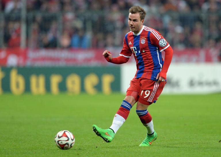 Bayern Munich's midfielder Mario Goetze plays the ball during a German Football Cup DFB Pokal match against Eintracht Braunschweig in Munich on March 4, 2015