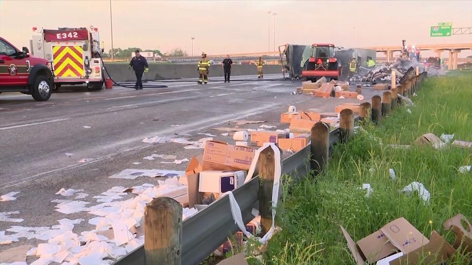 The truck carrying industry-sized toilet rolls crashed and caught fire near Dallas, Texas (KDFW-FOX 4 NEWS)