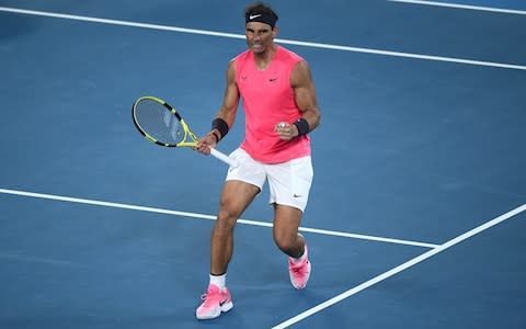 Nadal, meanwhile, celebrates taking the third set - Credit: GETTY IMAGES