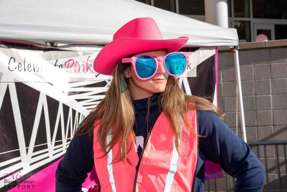 Volunteer from UNH is sporting the look to support local breast cancer patients at this year’s Celebrate Pink 5K Run & Walk.