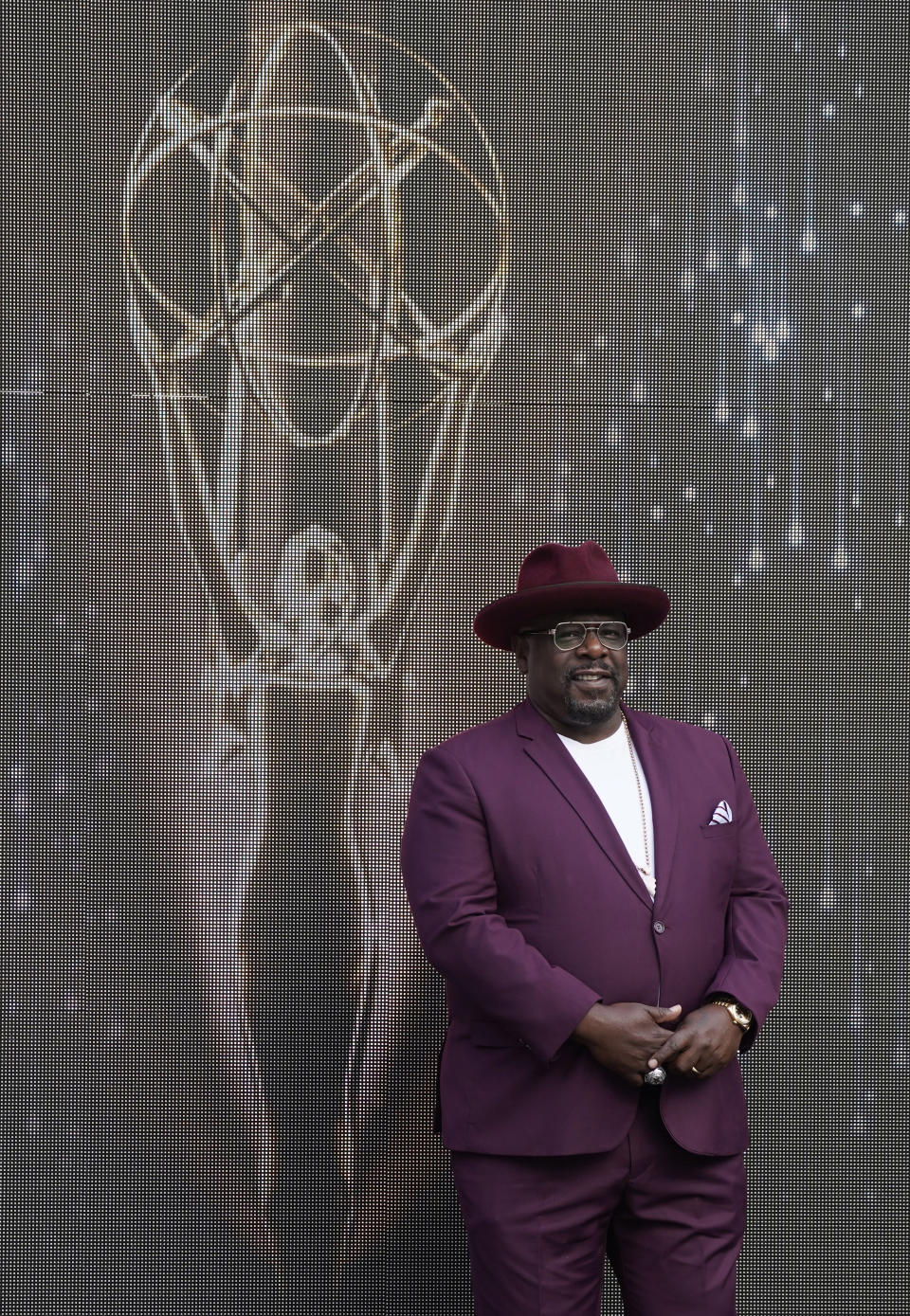 Cedric the Entertainer, host of Sunday's 73rd Primetime Emmy Awards, stands onstage during the show's Press Preview Day, Wednesday, Sept. 14, 2021, at the Television Academy in Los Angeles. The awards show honoring excellence in American television programming will be held at the Event Deck at L.A. Live. (AP Photo/Chris Pizzello)