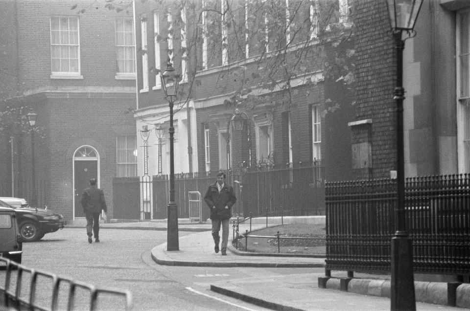 Scene outside Downing Street, London, 30th November 1982. The Prime Minister, Margaret Thatcher, has left to the building due to security alert after one of her staff, office manager Peter Taylor, was injured after opening a letter bomb, fire bomb. Letters from a group called the Animal Rights Militia, ARM, were in the Downing Street package. (Photo by Andy Hosie/Daily Mirror/Mirrorpix/Getty Images)