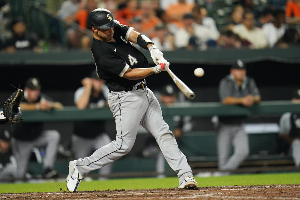 Chicago White Sox's Seby Zavala flies out against the Baltimore Orioles during the fifth inning of a baseball game, Thursday, Aug. 25, 2022, in Baltimore. (AP Photo/Julio Cortez)