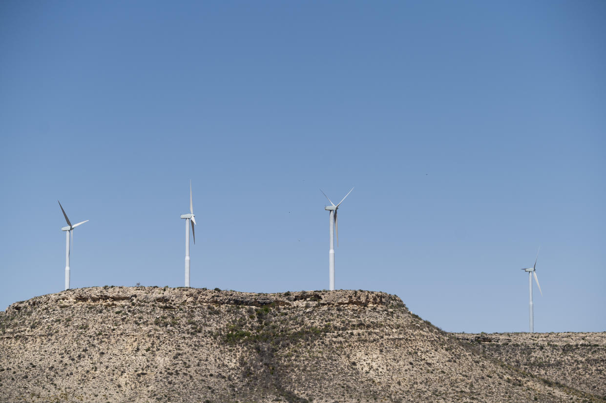 UNITED STATES - APRIL 10: Wind turbines stand near Fort Stockton, Texas on Saturday, April 10, 2021. (Photo By Bill Clark/CQ-Roll Call, Inc via Getty Images)