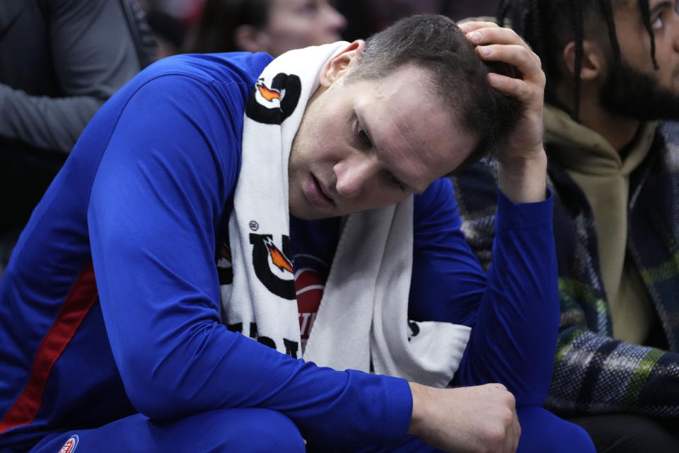 Detroit Pistons forward Bojan Bogdanovic sits on the bench during the second half of the team's NBA basketball game against the Chicago Bulls in Chicago, Friday, Dec. 30, 2022. The Bulls won 132-118. (AP Photo/Nam Y. Huh)