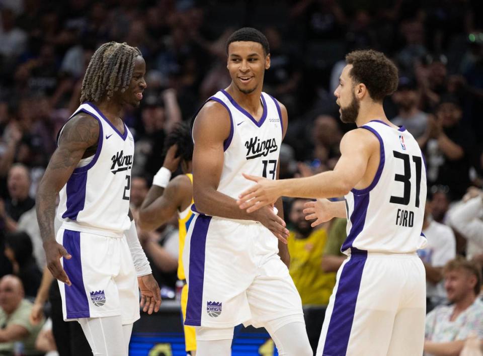 Sacramento Kings Keegan Murray is congratulated by teammates Jordan Ford and Keon Ellis during the California Classic Summer League at Golden 1 Center Monday, July 3, 2023 in Sacramento.