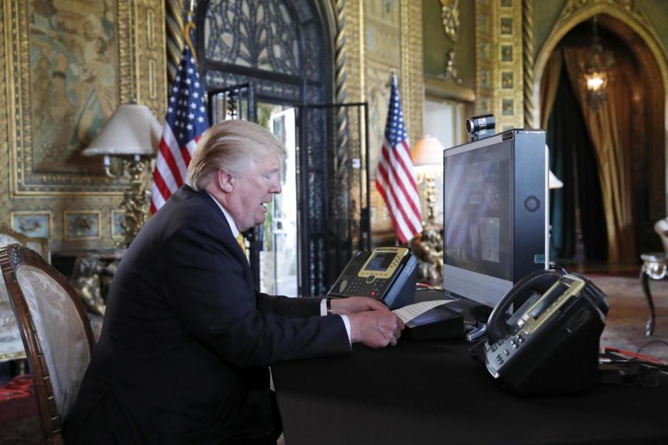 Donald Trump speaks with members of the armed forces via video conference at Mar-a-Lago (AP)