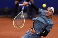 Jan-Lennard Struff of Germany returns the ball during the final match against Taylor Fritz of the United States at the Tennis ATP tournament in Munich, Germany, Sunday, April 21, 2024. (AP Photo/Matthias Schrader)