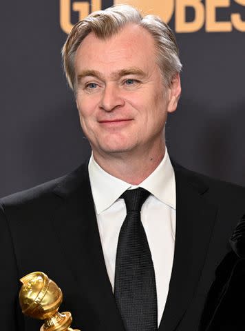 <p>Gilbert Flores/Golden Globes 2024/Golden Globes 2024 via Getty</p> Christopher Nolan at the Golden Globes