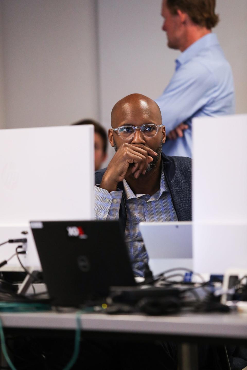 Brad Holmes ponders the draft board during Day 2 of the 2019 NFL draft in Agoura Hills, California, on Friday, April 26, 2019.