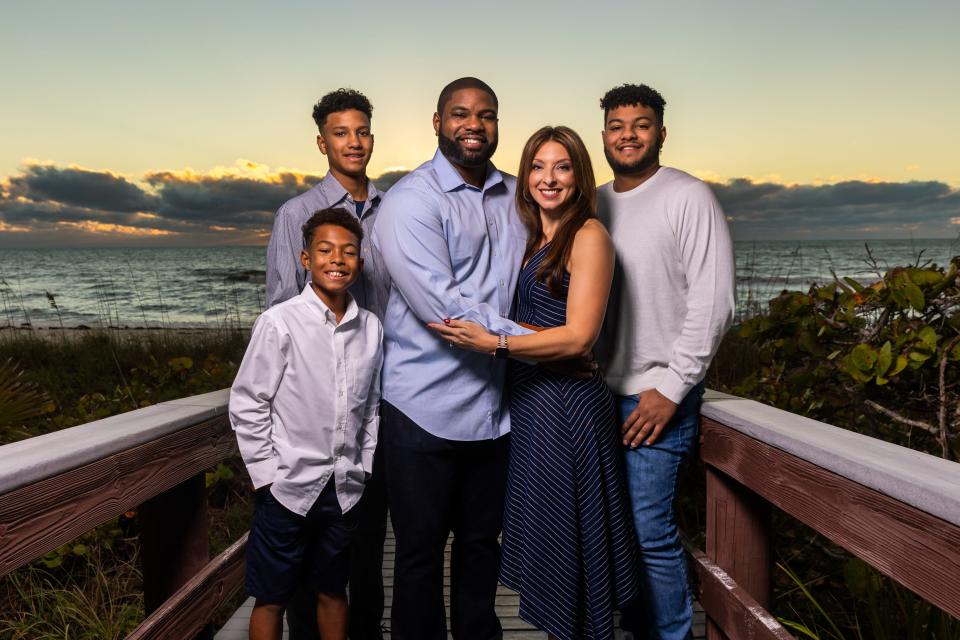 Byron and Erika Donalds with their sons, Mason, 11, front; Darin, 16, left and Damon, 20, right.