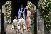 <p>The Duchess of Cambridge was pictured heading into St. Mark’s Church with the page boys and girls ahead of the ceremony. (Photo: PA) </p>