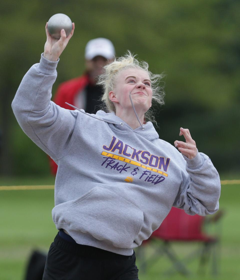 Maggie Hofner of Jackson competes in the shot put at the Division I District Track and Field Meet held at Hoover High School.