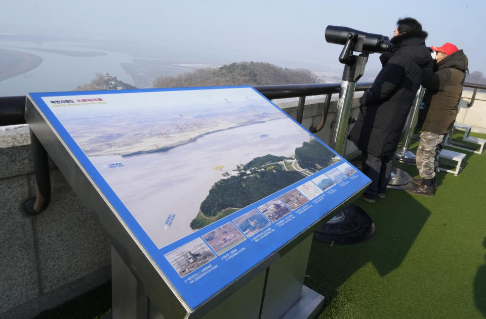 Visitors watch the North Korea side from the Unification Observation Post in Paju, South Korea, Wednesday, Jan. 10, 2024. North Korean leader Kim Jong Un has called South Korea "our principal enemy" and threatened to annihilate it if provoked, as he escalates his inflammatory, belligerent rhetoric against Seoul and the United States before their elections this year. (AP Photo/Ahn Young-joon)