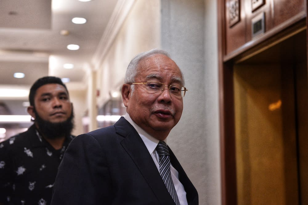 Datuk Seri Najib Razak arrives at the Kuala Lumpur High Court June 26, 2019. — Picture by Shafwan Zaidon