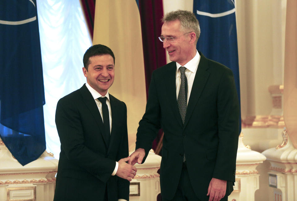 Ukrainian President Volodymyr Zelenskiy, left, welcomes NATO Secretary General Jens Stoltenberg during their meeting in Kyiv, Ukraine, Thursday, Oct. 31, 2019. ( AP Photo/Efrem Lukatsky)