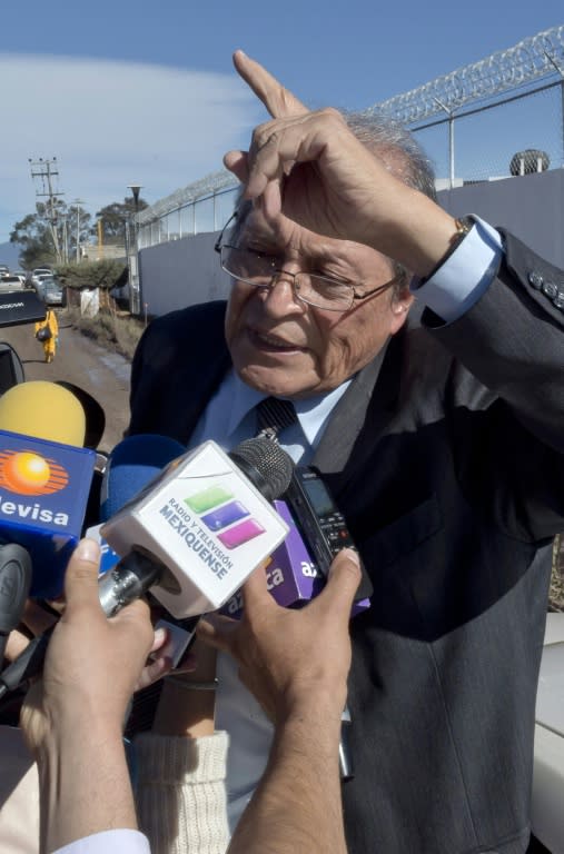 Joaquin "El Chapo" Guzman's lawyer Juan Pablo Badillo gestures as he speaks to the press outside the penitentiary of Almoloya de Jaurez, Mexico, on Januay15, 2016