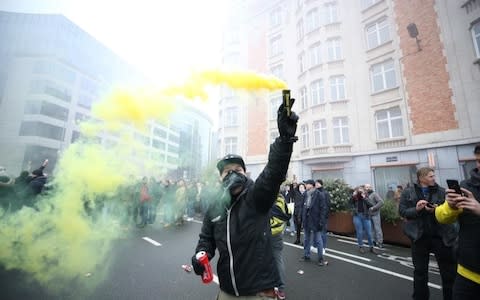 Anti-migrant protesters gathered in Brussels before being dispersed by tear gas and water cannon - Credit: Dursun Aydemir/Anadolu Agency/Getty Images
