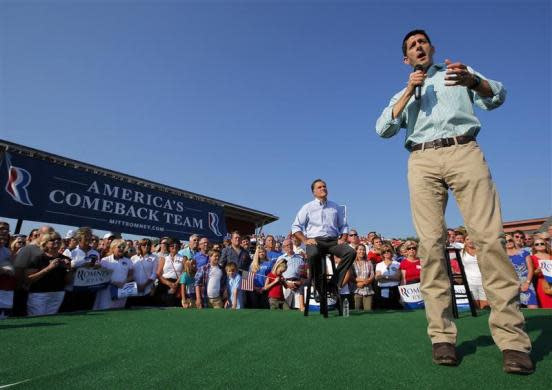 Republican presidential candidate and former Massachusetts Governor Mitt Romney is introduced by vice-presidential candidate Congressman Paul Ryan (R) at a campaign rally in Powell, Ohio August 25, 2012.
