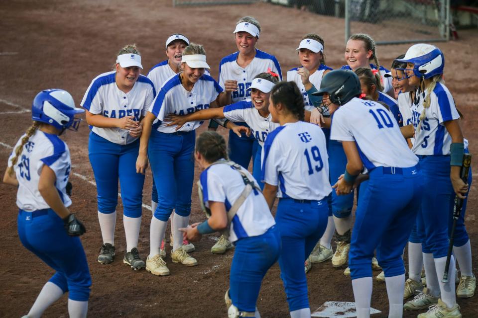 Twin Cedars' Jillian French (29) is greeted by teammates at home plate after her home run against Southeast Warren during the Class 1A softball state championship at the Harlan Rogers Sports Complex Friday, July 22, 2022 in Fort Dodge. 