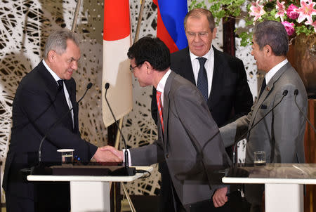 Russian Foreign Minister Sergei Lavrov and Defence Minister Sergei Shoigu attend their joint news conference with Japanese Foreign Minister Taro Kono and Defense Minister Takeshi Iwaya after their two-plus-two Foreign and Defense Ministers meeting between Japan and Russia at the Iikura Guest House in Tokyo, Japan, May 30, 2019. Kazuhiro Nogi/Pool via Reuters