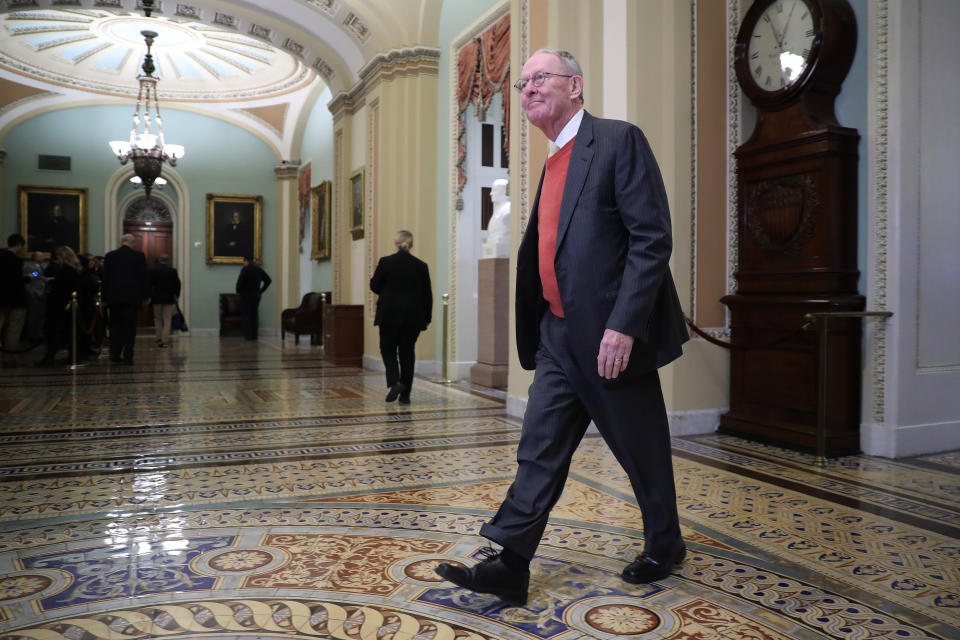 WASHINGTON, DC - JANUARY 21: Sen. Lamar Alexander (R-TN) heads toward the Senate Chamber before the start of President Donald Trump's impeachment trial at the U.S. Capitol January 21, 2020 in Washington, DC. Senators will vote Tuesday on the rules for the impeachment trial, which is expected to last three to five weeks. (Photo by Chip Somodevilla/Getty Images)