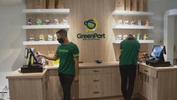 GreenPort Cannabis employees fill orders during the store's grand opening on Oct. 17, 2020.