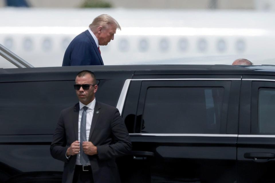 Republican presidential candidate former US President Donald Trump arrives at the Miami International ahead of his arraignment on federal charges (Getty Images)