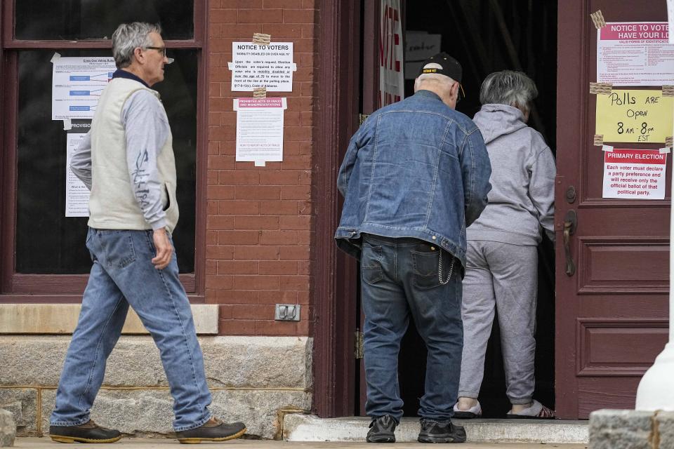 Voters enter a polling facility at the Seale Courthouse in Russell County during a primary election, Tuesday, March 5, 2024, in Seale, Ala. Fifteen states and a U.S. territory hold their 2024 nominating contests on Super Tuesday this year. (AP Photo/Mike Stewart)