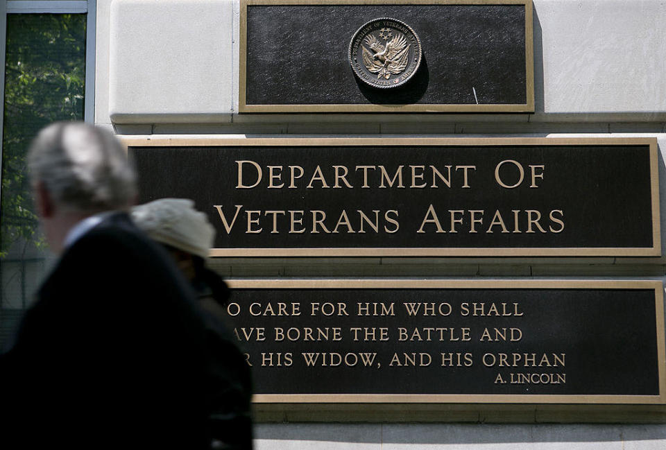 Pedestrians walk past the U.S. Department of Veterans Affairs headquarters in Washington, D.C. / Credit: Andrew Harrer/Bloomberg via Getty Images