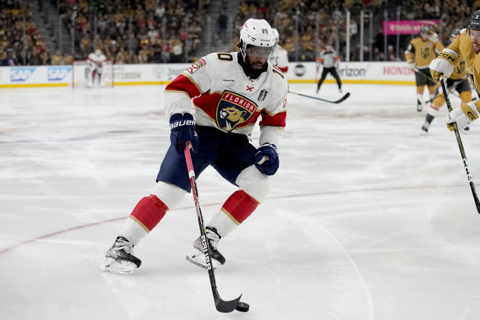 Florida Panthers left wing Anthony Duclair (10) moves the puck against the Vegas Golden Knights during the third period of Game 1 of the NHL hockey Stanley Cup Finals, Saturday, June 3, 2023, in Las Vegas. (AP Photo/John Locher)