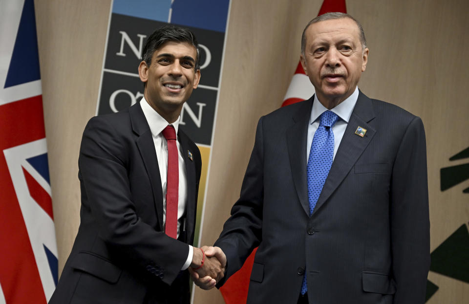 Britain's Prime Minister Rishi Sunak, left, shakes hands with Turkey's President Recep Tayyip Erdogan during a bilateral meeting on the sidelines of a NATO Summit in Vilnius, Lithuania, Tuesday July 11, 2023. (Paul Ellis/Pool Photo via AP)