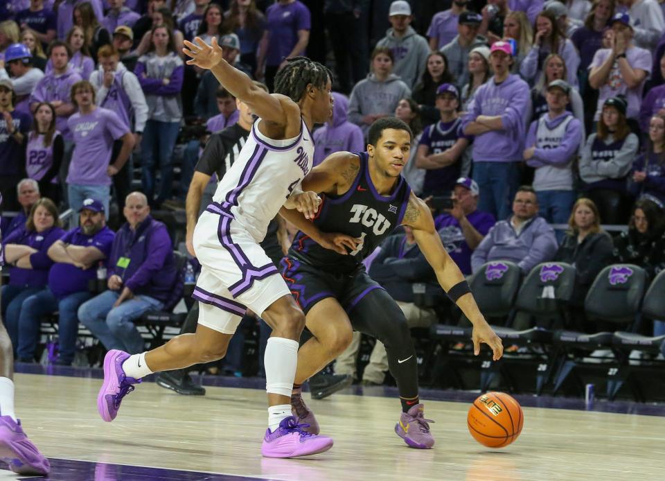 TCU Horned Frogs guard Jameer Nelson Jr. (4) dribbles against Kansas State Wildcats guard Dai Dai Ames (4) during the second half at Bramlage Coliseum.