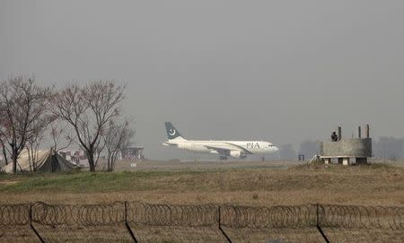 A Pakistan International Airlines (PIA) passenger plane prepares to take off from the Benazir International airport in Islamabad, Pakistan, February 9, 2016. REUTERS/Faisal Mahmood