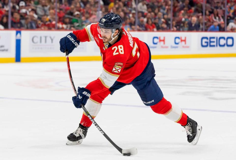 Florida Panthers defenseman Josh Mahura (28) shoots the puck against the San Jose Sharks in the second period of their NHL game at the Amerant Bank Arena on Tuesday, Oct. 24, 2023, in Sunrise, Fla.