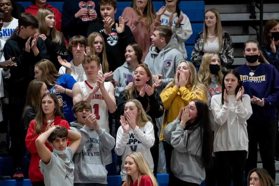 The Neshaminy student section cheers during a basketball game against Pennsbury, on Thursday, December 16, 2021, at Neshaminy High School in Langhorne. Neshaminy beat Pennsbury in triple overtime, 81-78.