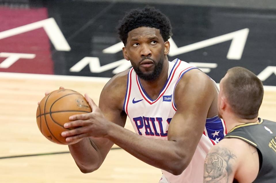 76ers star Joel Embiid looks to shoot.