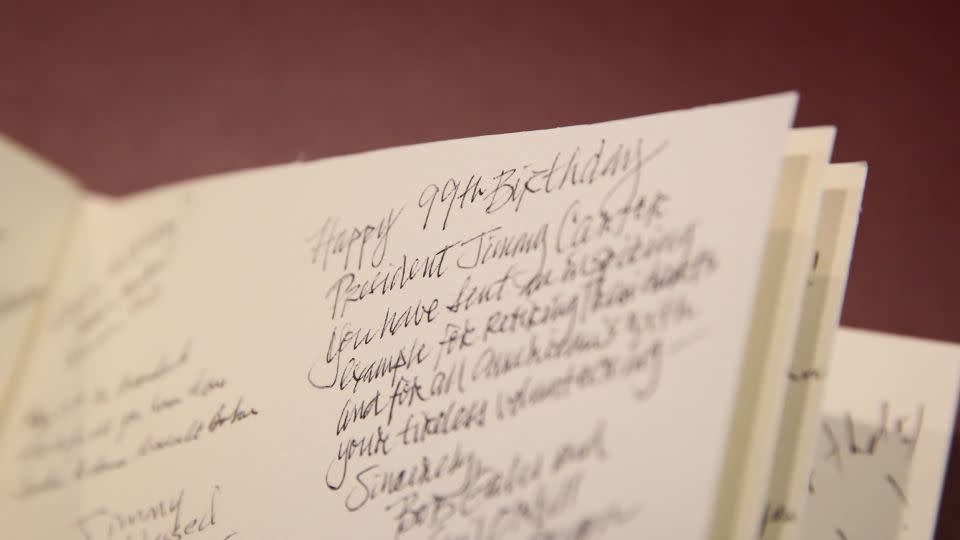 Birthday wishes for Jimmy Carter are seen Thursday in a book at The Carter Center in Atlanta. - Austin Steele/CNN