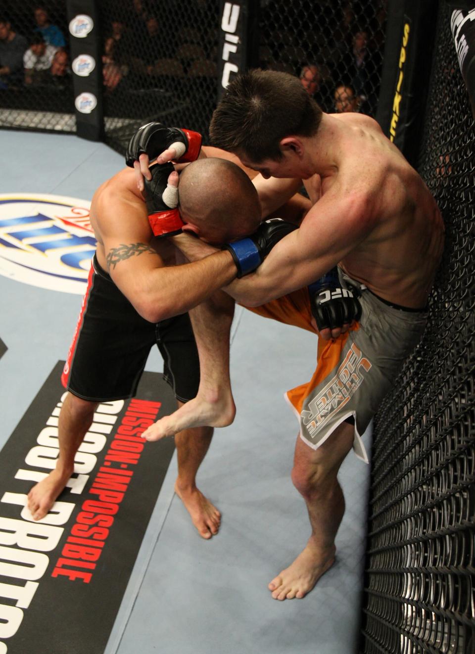 Steven Siler hits Josh Clopton with a knee during The Ultimate Fighter 14 Finale at the Pearl Theatre at the Palms Hotel and Casino on December 3, 2011 in Las Vegas, Nevada. (Photo by Josh Hedges/Zuffa LLC/Zuffa LLC via Getty Images)