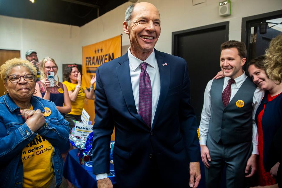 Winner of the Democratic primary for U.S. Senate Mike Franken, retired Navy admiral from Sioux City, enters his election night gathering, on Tuesday, June 7, 2022, at Franklin Junior High, in Des Moines. 